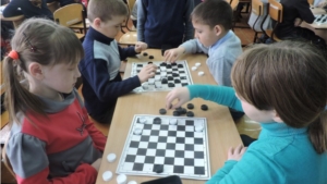 Турнир  по шашкам среди обучающихся начальных классов