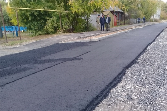 Отремонтированные дорога и тротуар по улице Колхозной, тротуар по улице Горького